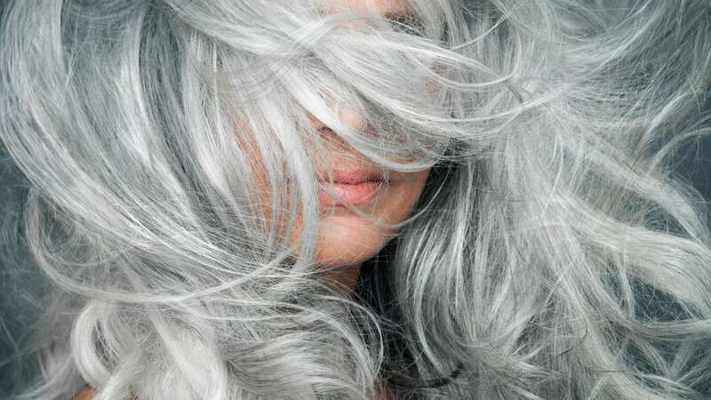 Grey hair may be due to stem cells getting stuck, researchers have found (Image: Getty Images)
