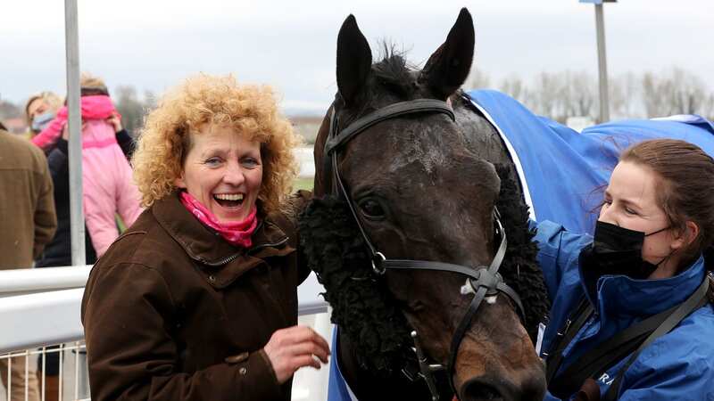 Trainer Lucinda Russell with 2021 Scottish Grand National winner Mighty Thunder who has died (Image: Getty)