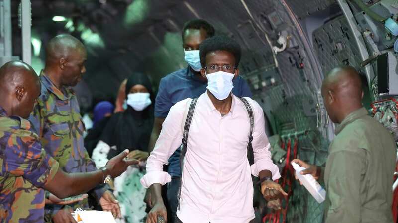 The first group of Kenyan evacuees arrive at Nairobi Airport after the world scrambled to get its civilians out of a country headed for civil war (Image: AP)