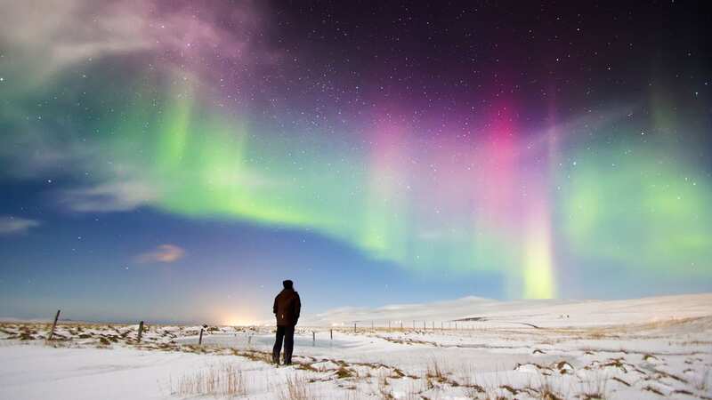 The Northern Lights are top of the list of travel experiences people regretted missing out on (Image: Getty Images)