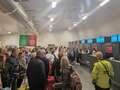 Holidaymakers miss flights as IT chaos sees airport screens tell them to 'relax' eiqetidzrizinv