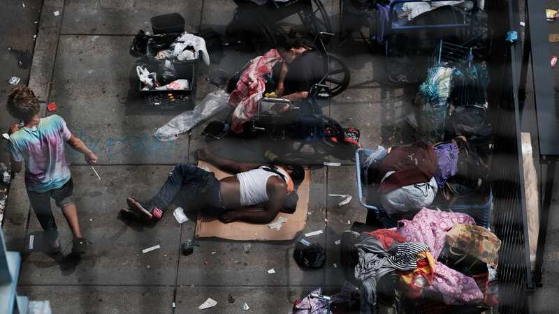 Drug users in Philadelphia line the streets in a harrowing scene (Image: Getty Images)
