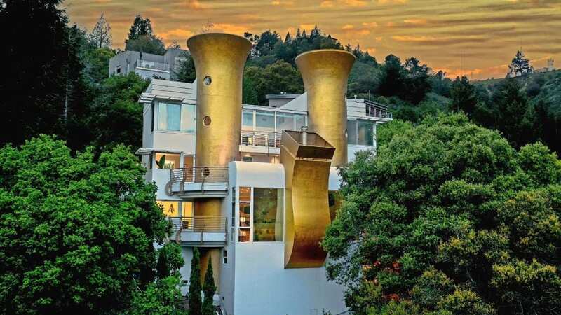 The gold towers give the mansion the look of a musical instrument (Image: MercadoVisualz)