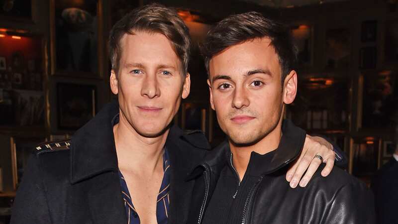 Dustin Lance Black with husband, Olympic driver Tom Daley (Image: Getty)