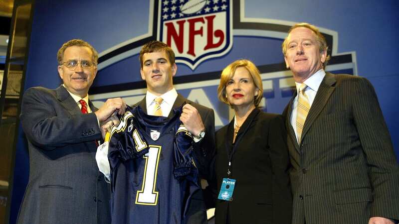 Eli Manning looked rather glum after being drafted by the San Diego Chargers