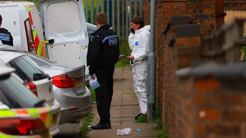 Police and forensics at the scene off Victoria Road where a man was found dead (Image: Coventry Telegraph/BPM MEDIA)