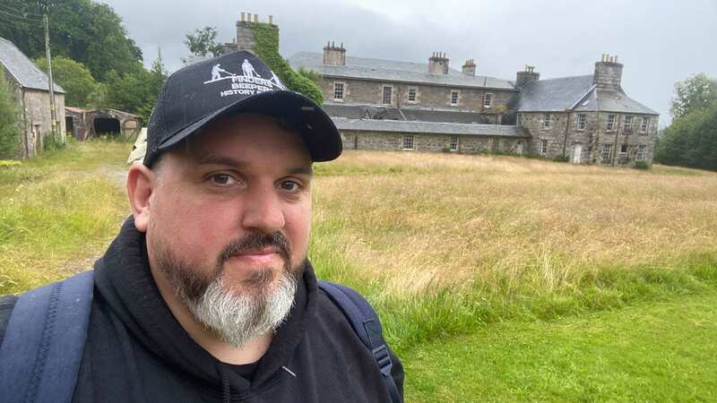 YouTuber Matt outside the abandoned mansion in the Scottish Highlands (Image: Finders Beepers History Seekers / CATERS NEWS)