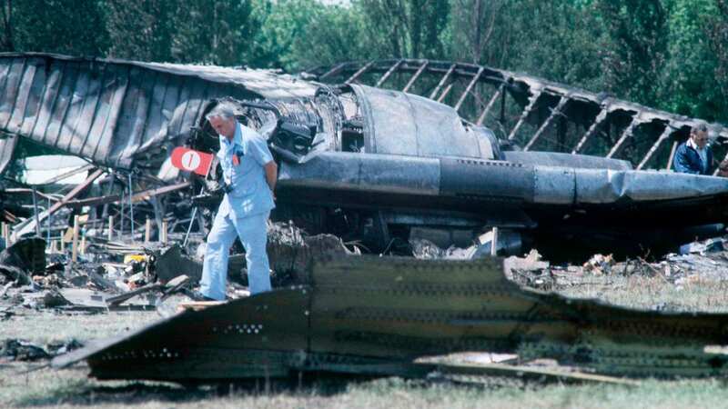 Investigators examine the wreckage of Flight 191 (Image: AP)