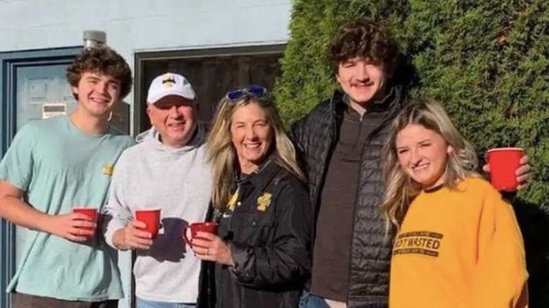 Jim and Stacy Chapin pose with their triplets at the University of Idaho parent weekend in November 2022, one week before their son Ethan (second from right) was killed (Image: Stacey Chapin)