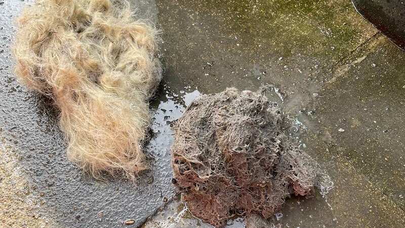 The clean up team discovered a pair of wigs as the culprits behind the blockage (Image: Yorkshire Water / SWNS)