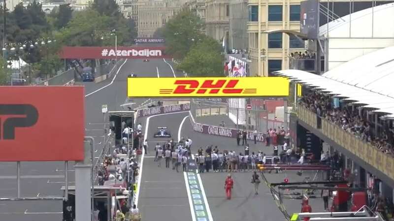Photographers in the pit lane as Esteban Ocon comes in at the end of the Azerbaijan GP (Image: Sky Sports)