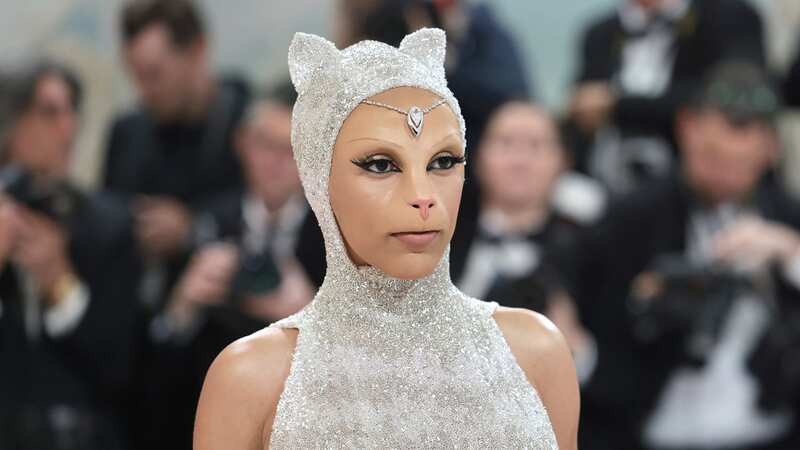Doja Cat dresses as Karl Lagerfeld