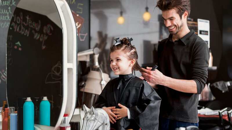 The girl was so happy to get her hair cut (stock photo) (Image: Getty Images)