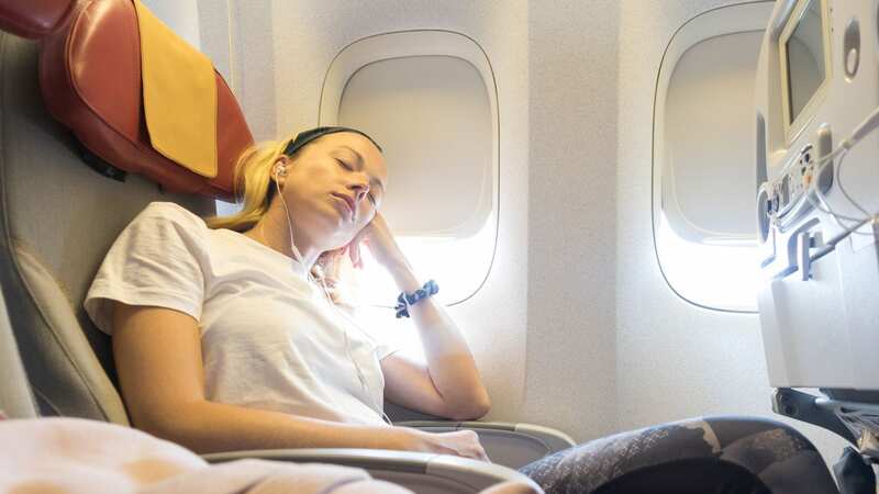 The tip can help you grab 40 winks on a flight (Image: Getty Images/EyeEm)