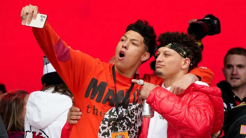 Jackson Mahomes celebrated on stage with older brother Patrick Mahomes during the Kansas City Chiefs Super Bowl LVII victory parade