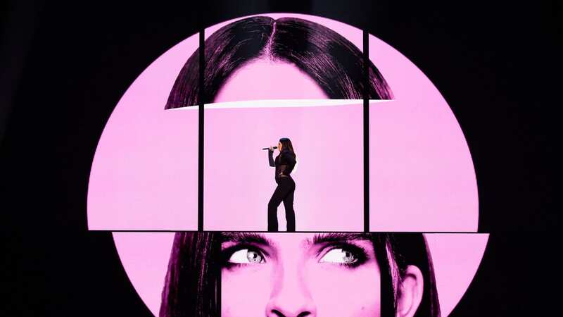 Singer Mae performs in front of huge video wall (Image: Corinne Cumming 2023)