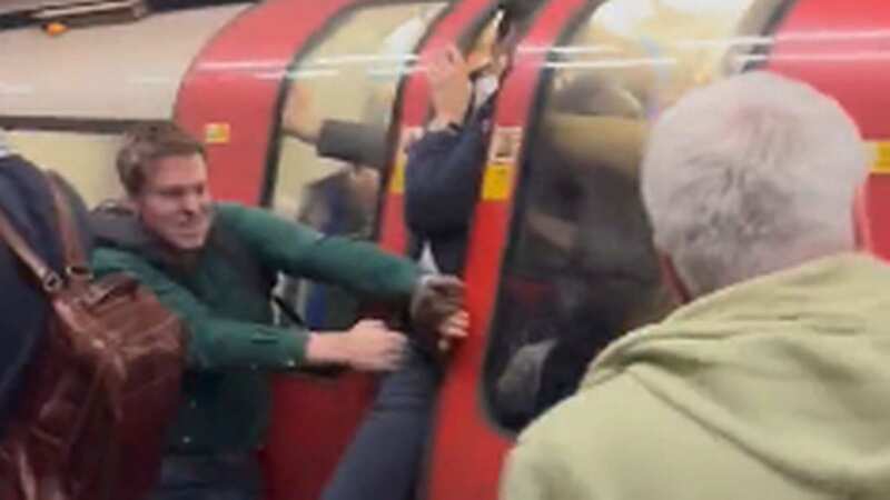 London tube chaos as passengers smash glass to escape train after 