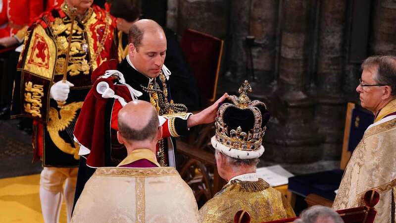 King murmurs three heartfelt words to William after kissing his cheek