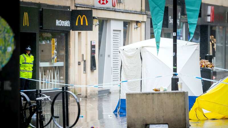 Forensic officers at the scene in Bath (Image: Daniel Jae Webb / SWNS)