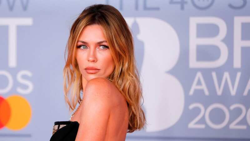 Abbey Clancy has dressing gown trick which confuses frisky husband Peter Crouch