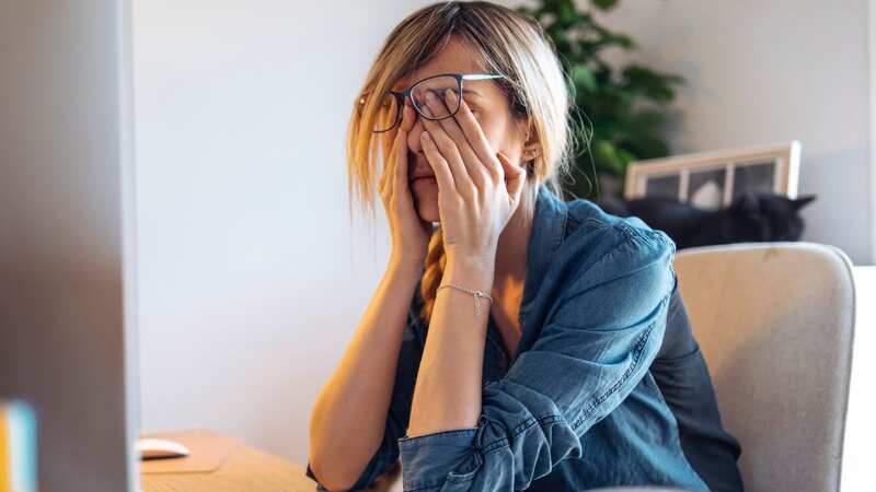 Unexplained tiredness - while explained by many things - could be an early warning sign of cancer (Image: Getty Images/Westend61)