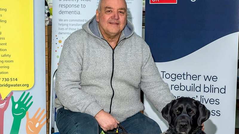 John Hardy with his guide dog Sidney (Image: Brian Bateman / SWNS)