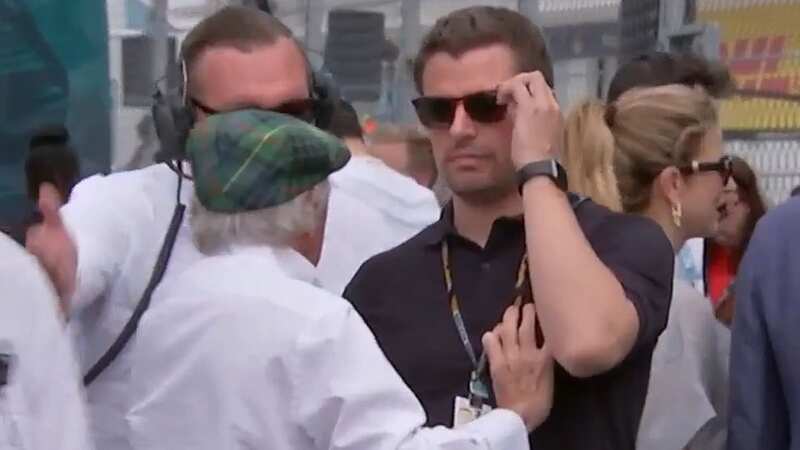 Sir Jackie Stewart was confronted by a security guard on the Miami GP grid (Image: Sky Sports)