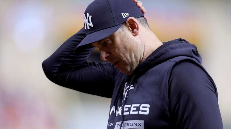 New York Yankees manager Aaron Boone reacts against the Houston Astros during the eighth inning in game two of the American League Championship Series at Minute Maid Park