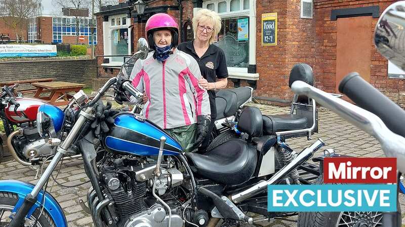 Margaret with trike and pub boss Elaine