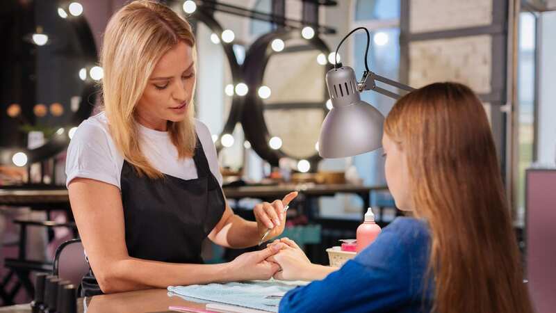 The girl turned up with false nails (Stock Image) (Image: Getty Images/iStockphoto)