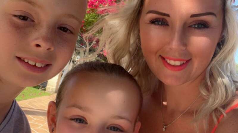 Rachel and her two children, Brayden and Elianna, on holiday in Majorca (Image: Rachel Smith / SWNS)