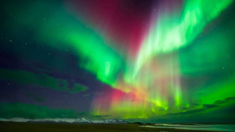 The Northern Lights has topped travel bucket lists for Brits (Image: Elena Pueyo/Getty Images)