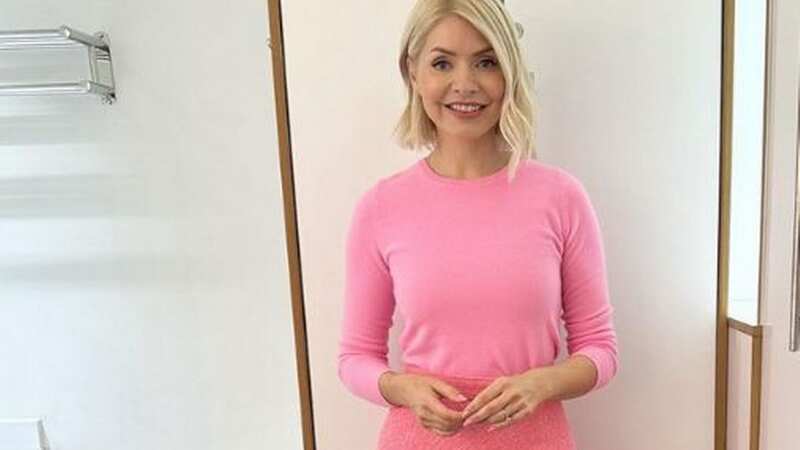 Holly brightened up our screens today in a full pink outfit