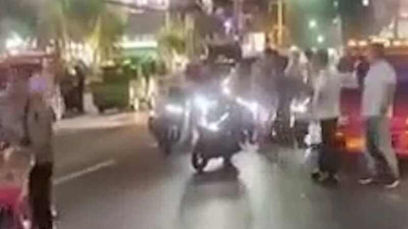 Moment arrested Brit tourist launches attack on tuk tuk driver in street brawl