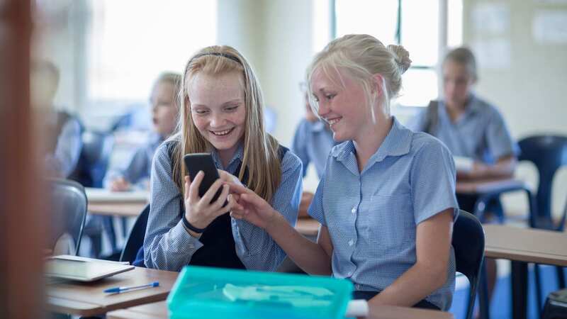 Campaigners are calling for the government to ban smartphones in schools (Image: Getty Images/Westend61)