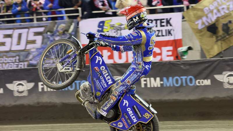 Zmarzlik holds the World Championship trophy that all 15 riders want to win (Image: FIMSpeedway.com)