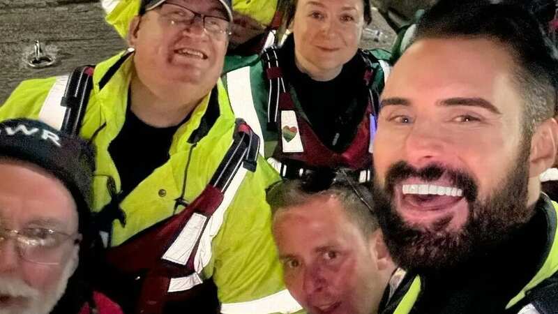 BBC Radio Two stars Rylan and Scott Mills had to be rescued by Merseyside Water Rescue after they left a restaurant next to the Eurovision Stadium and were mobbed by fans! (Image: @Rylan/Twitter)