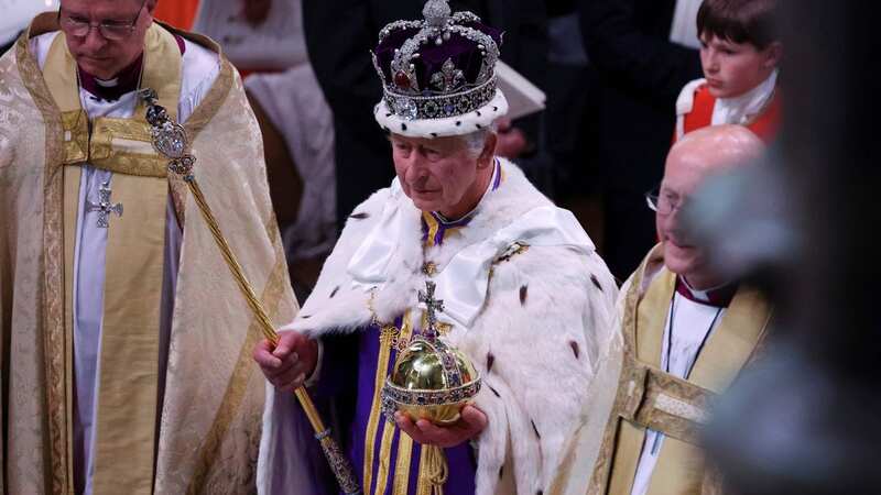 The King at Westminster Abbey in the Imperial State Crown (Image: POOL/AFP via Getty Images)