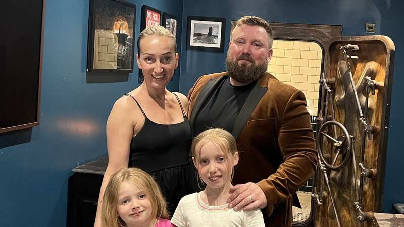 Dave Massey with his wife Magdalena and daughters, Sofia (Right) and Isabella, inside the man cave bunker (Image: PA Real Life)