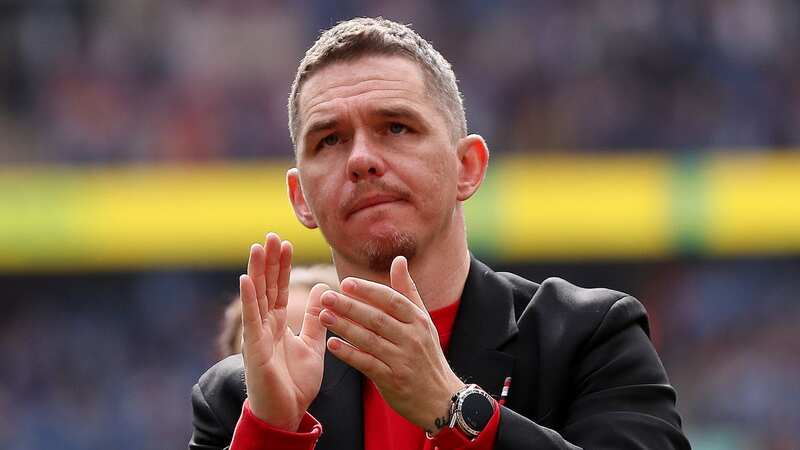 Manchester United Head Coach Marc Skinner applauds the fans at the end of the Vitality Women