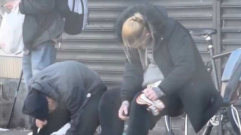 People suspected of taking the horrific new drug sit slumped in the street (Image: KTLA)