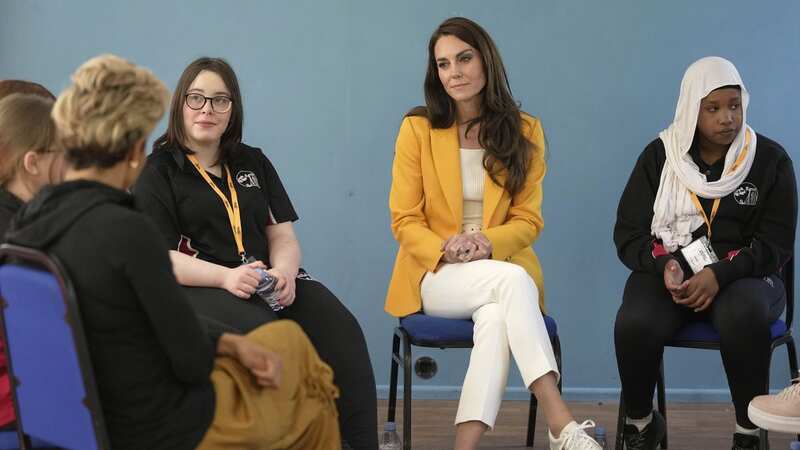 Kate Middleton opened up on a charity visit to a school (Image: Kin Cheung/AP/REX/Shutterstock)