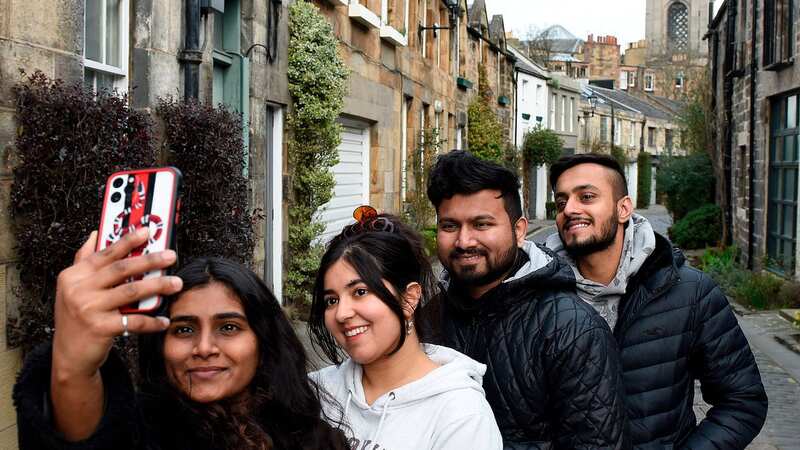 Rahil Raj and friends were visiting Circus Lane for a spot of selfie-taking on Tuesday (Image: Daily Record)