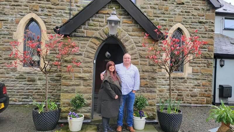 Lianne Clapham and Stephen Morris outside their four-bed converted church home in Cefn Pennar, Mountain Ash (Image: Lianne Clapham)