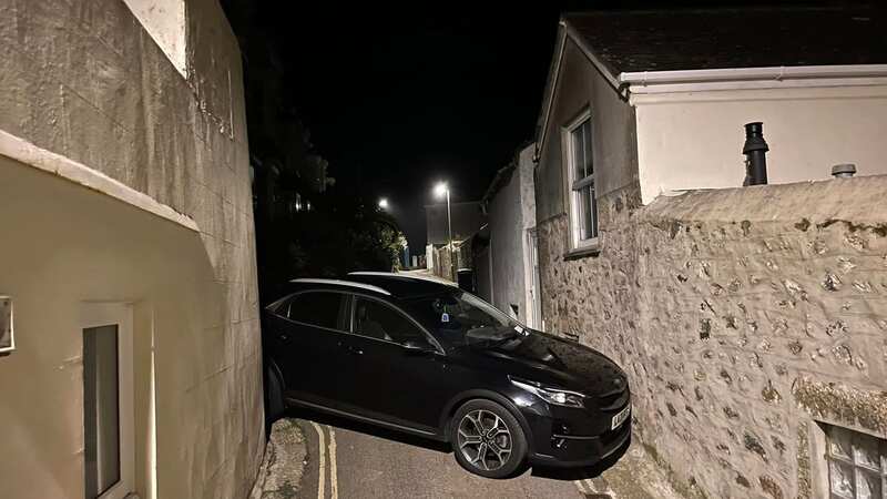 A black car completely blocked off a road in St Ives, Cornwall (Image: Billy Thomas)