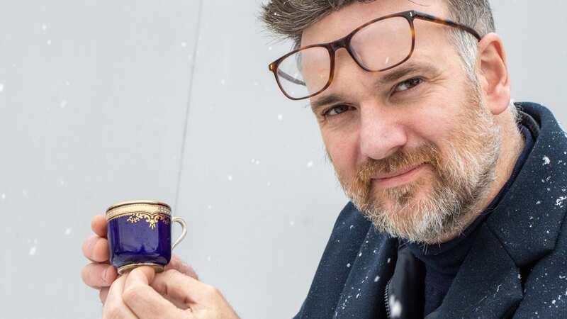 Auctioneer Charles Hanson saved the cup from a dusty worktop (Image: Mark Laban Hansons / SWNS)