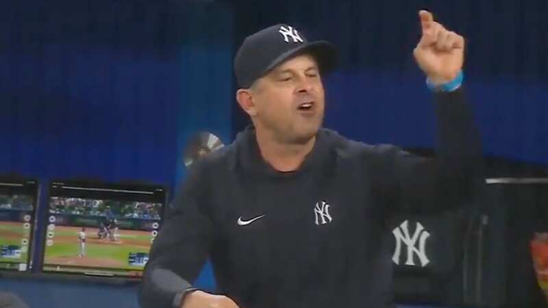 Yankees coach Aaron Boone appeared to hit out at a rival coach (Image: Getty)