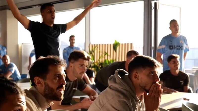 Manchester City players and staff gathered to watch the match (Image: @ManCity/Twitter)