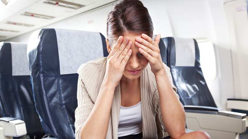 A woman, who suffers from allergies, was disgusted when a passenger sprayed perfume in her face (stock photo) (Image: Getty Images/iStockphoto)