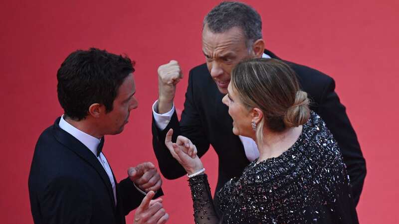 The Cannes film festival red carpet staffer has now spoken out (Image: AFP via Getty Images)